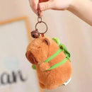 Chaveiro Capivara Mochila Tartaruga Fofo Sino Pelúcia 12cm Cor Marrom-claro